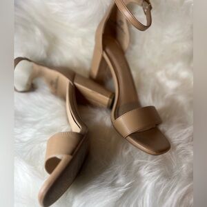 Mk high heels, and two small tears as seen in pictures but still a lot of life.